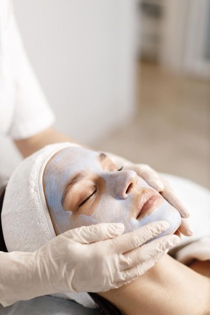 "A dermatologist examining a patient's skin during a regular assessment, emphasizing the importance of routine skin care check-ups for maintaining healthy skin."