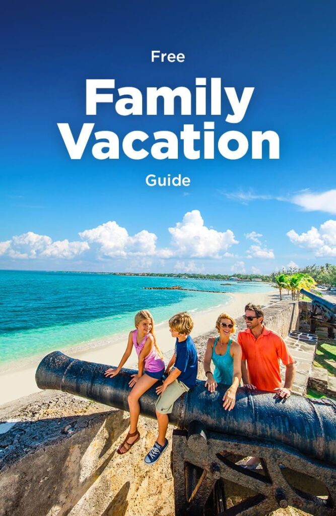 Family researching their vacation destination thoroughly with a laptop, travel guides, and maps, planning an ideal family vacation.