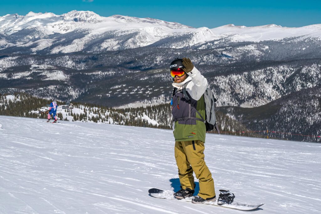 "Scenic view of Aspen, Colorado, one of the best vacation spots for skiing and snow sports enthusiasts, with snow-covered mountains and ski slopes."