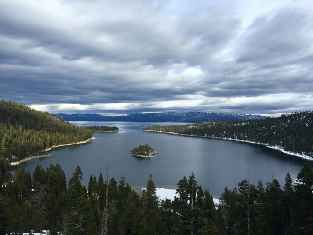 "Snow-covered landscape at Lake Tahoe, USA, showcasing winter activities like skiing and snowboarding, highlighting it as one of the best vacation spots for winter fun."